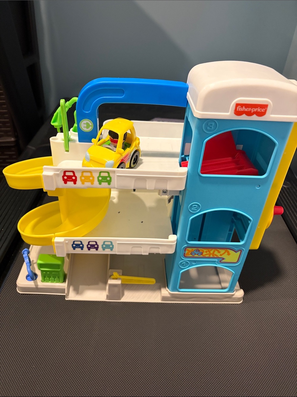 Fisher-Price Car Garage Playset with Yellow Car and green car